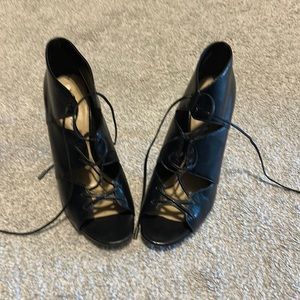 Lace up black leather heels